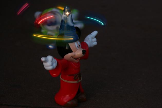 [Who knew Mickey was a fan of the art of glowsticking?]